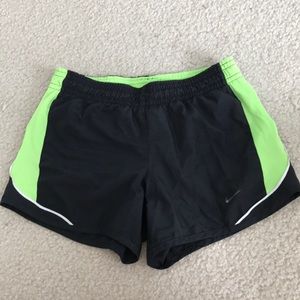 Black and green Nike shorts